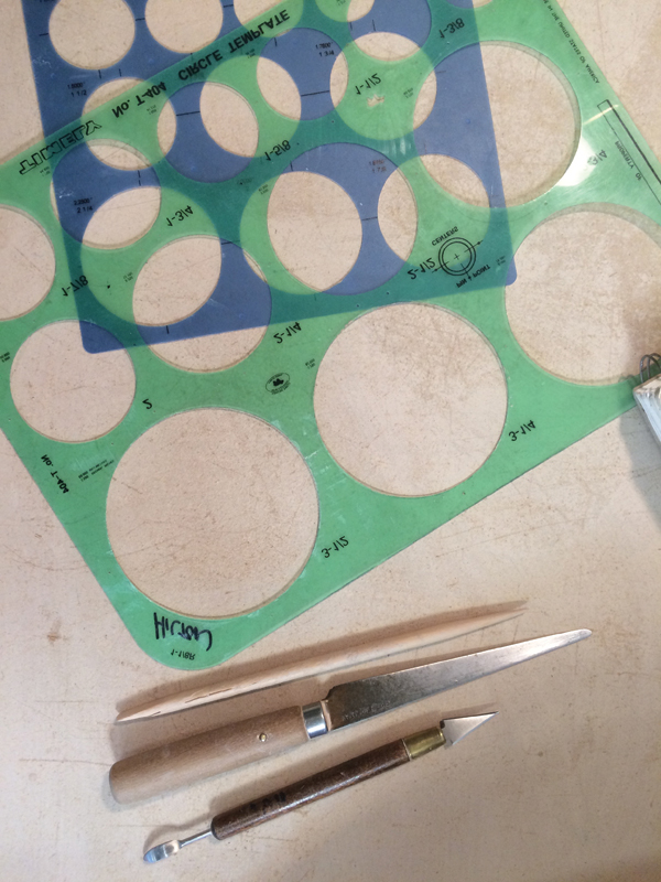 2 All of the tools (including the plastic circle templates) used to fit and attach a teapot spout. 