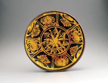11. Top: Michelle Erickson, London Slipware Charger #1, 15 ½ inches in diameter.