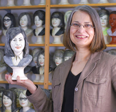 The artist pictured with her own portrait from the Good Girls 1968 series.