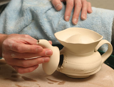 Fig.10 Score the clay and carefully attach the spout to the pourer.