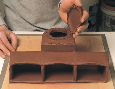 Fig.19 Add a small dome to the top of the column. Cut a hole to prevent trapping air between the two slabs.