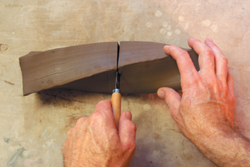 Fig.4 When leather hard, cut extrusions to length.