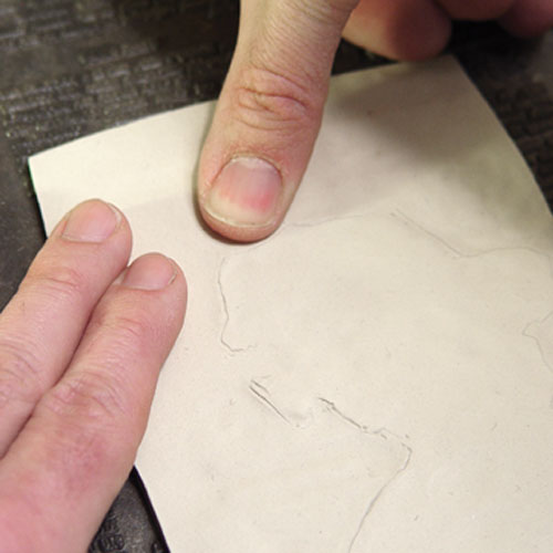 Fig.6 For additional impressions, press the clay up to the penciled edge.