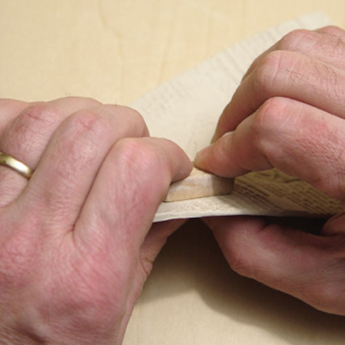 Fig.7 First erase a small area of the impression by rubbing it out. Then press the two textures together.
