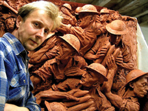 Paul Day at work on a deep relief sculpture in his studio in Sainte Sabine, France.