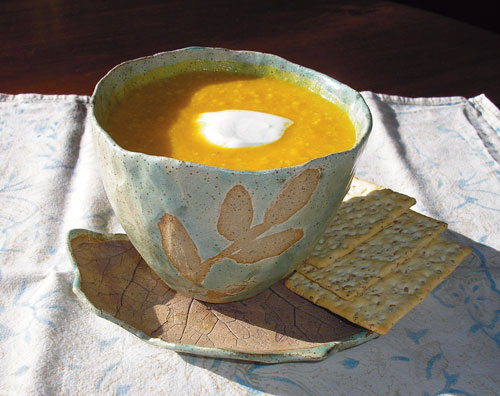 Cup and saucer, 4 1/2 in. (11 cm) in height, stoneware with iron oxide and glaze, fired to Cone 6, by Cara Graver, Chester Springs, Pennsylvania.