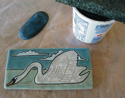 5. Swan tile after grouting, showing altered glaze colors.