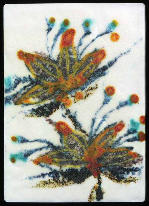White barium glaze ground, layered glazes and brushwork, fired at cone 8 in oxidation. Chrome/lead orange glaze applied with a fine trailer and refired to cone 010.
