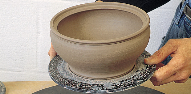 Big pot thrown on a wheel throwing bat