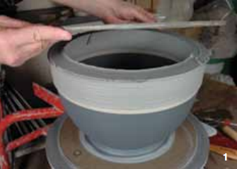 1 Each color section is thrown separately. While still attached to the bat, the next section is inverted and placed on the previous section rim to rim and then cut free from the bat.