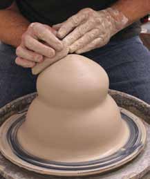 2 Shape the form into two tapered seg-ments then collar in and enclose the top.