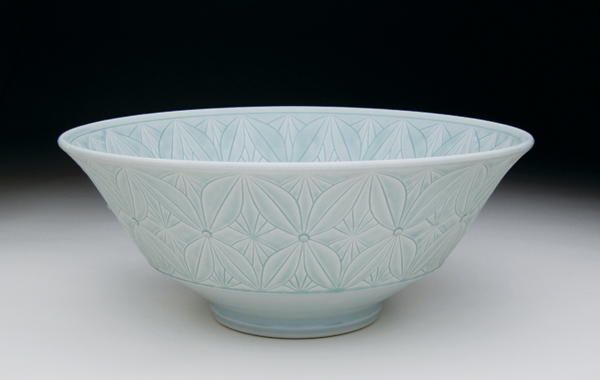 6 Serving bowl, 14 in. (36 cm) in diameter, wheel-thrown porcelain, carved pattern, celadon glazes, fired in reduction to cone 10, 2013.
