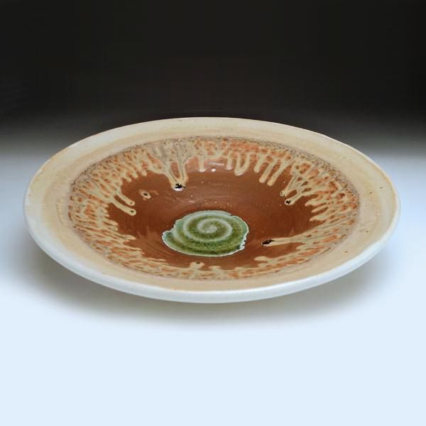 Wheel-thrown platter, ceramic, reduction fired.