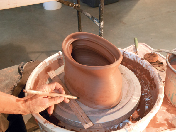 5 Use a ruler to mark where you wish to alter the pot.