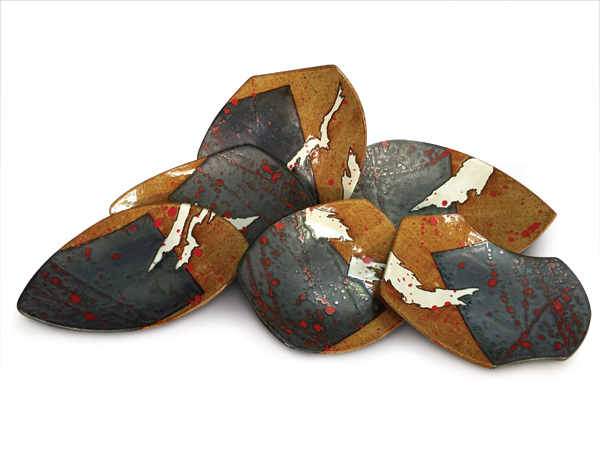 2 Set of six sushi plates, to 13 in. (33 cm) in length, slab-built and slump-molded stoneware, red underglaze, Pratt White glaze, Gun Metal Black glaze, Volcanic Ash glaze, black underglaze outlines to define shapes, wax and latext resist, fired to cone 6 in an electric kiln, 2016.