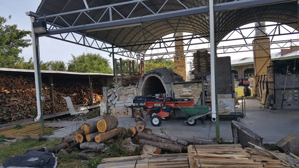 1 The outdoor kiln pad at the Morean Center for Clay in St. Petersburg, Florida. From left to right: wood shed, anagama kiln, train kiln.