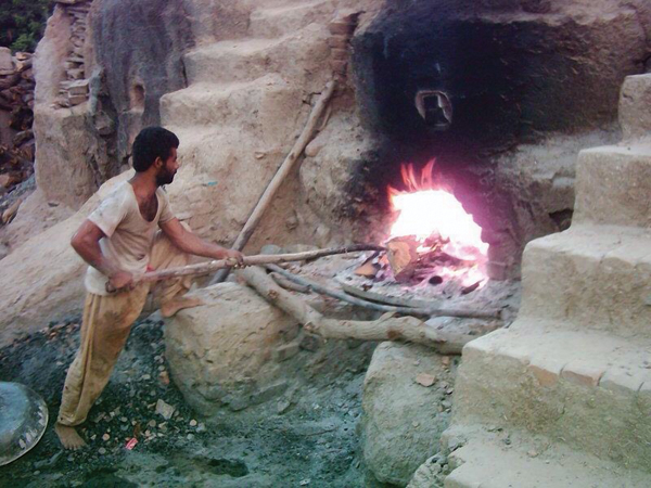 9 The traditional kiln is wood fired, and made by the tile maker by hand with mud. After loading, the kiln is fired for 14 hours to 1742°F (950°C) and then the temperature is brought lower.