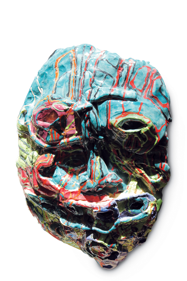 Cedric Johnson’s blue mask, 15 in. (38 cm) in height, sculptor’s-blend clay, fired to cone 05.