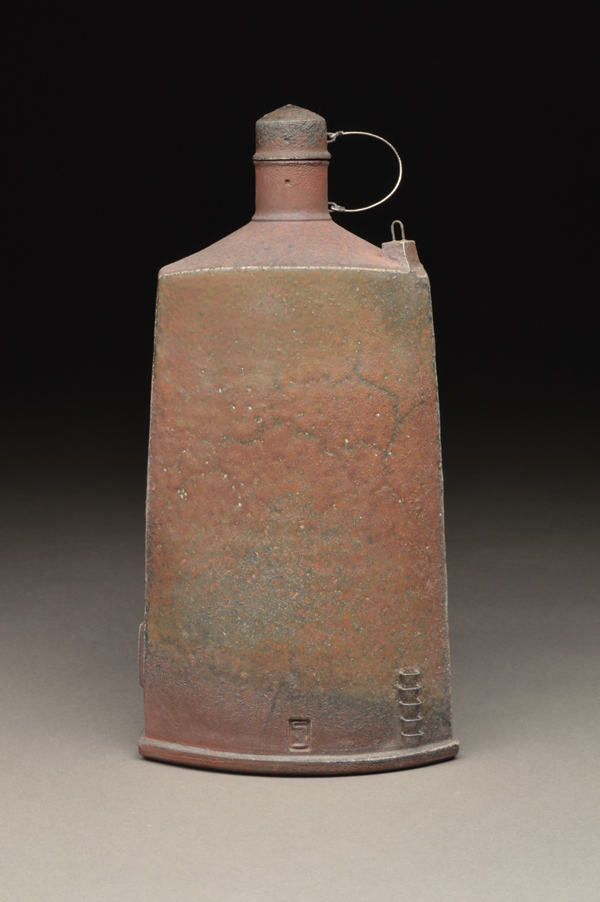 Stephen Heywood's triangle bottle with cork kickstand.