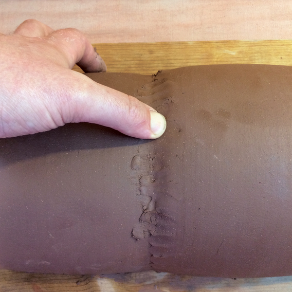 4 Use your fingers and a flexible rib to blend the outside seam together.