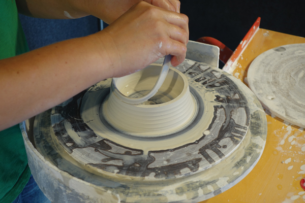 4 Throw a 4-inch-diameter cylinder, then use a needle tool to cut a section off for the gallery that is ½ inch tall, and 3⁄8 inch thick.