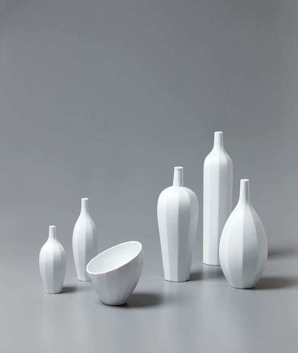Faceted liquor bottles, wheel-thrown porcelain, mid-range reduction fired, 2013. Courtesy of Moon Do Bang.