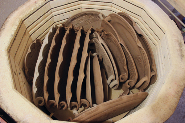  2 Brenda Danbrook’s fully loaded bisque kiln with vertically stacked plates.