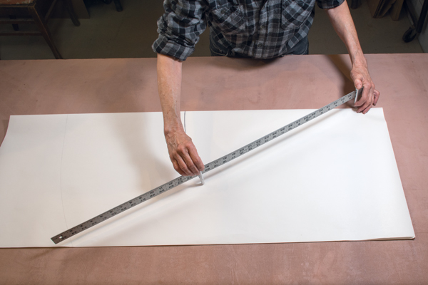 1 Use a trammel set to create a pair of arcs 15 inches apart on a folded sheet of newsprint or kraft paper.