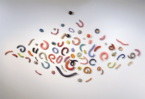1 Floating World: Bacteria, Diatoms and Cell Series (shown as installed at Carl Solway Gallery in Cincinnati, Ohio), stoneware, colored slips, underglazes, glazes, 1980s–2016. Photo: Cal Kowal. Courtesy of Carl Solway Gallery.