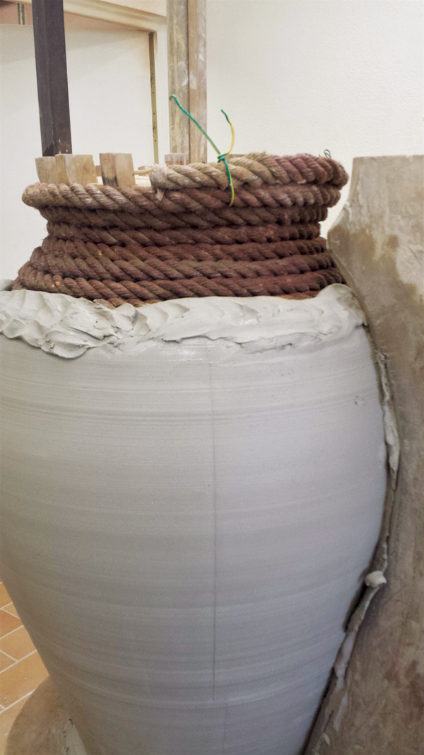 9 A completed coil section, ready to be compressed and shaped by the profile rib.