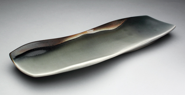 1 Platter, 20 in. (51 cm) in length, porcelain, fired to cone 10 in reduction, 2017. 
