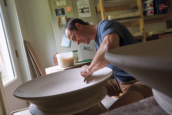 6 Noel Bailey finishing a large bowl, 2017. Photo: Corey Hendrickson.