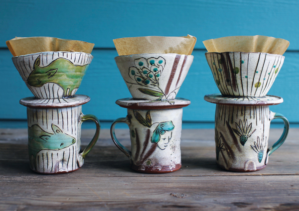 Trio of pour overs and matching mugs, 8 in. (20 cm) in height (each).