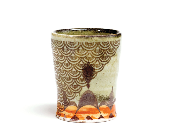 Whiskey cup, 4½ in. (11 cm) in height, porcelaneous stoneware, carbon-trapping celadon, gas reduction fired to cone 10, red copper oxide, oxide fusion print, 2017. Photo: McKenzie Shelton. 