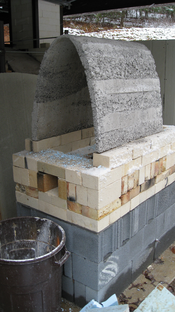 3 View of cast shell before the fiber and lath coating, brick door, and flue are installed.