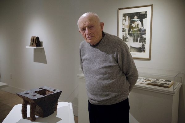1 Stanley Rosen standing alongside his piece, untitled, 7 in. (18 cm) in length, stoneware, fired to cone 9–10, 1960. Photo: Peter Crabtree.