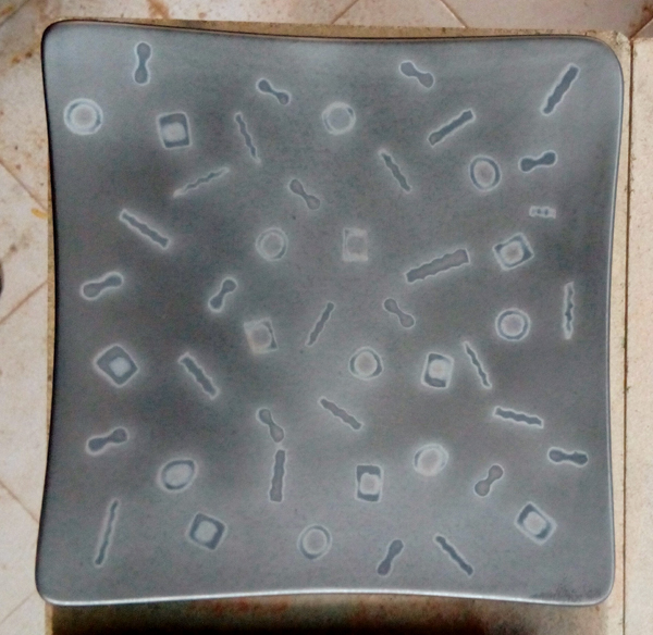9 Once the pieces have been removed, you should see the ways that thicker and thinner clay shapes create variations in the resist patterns.