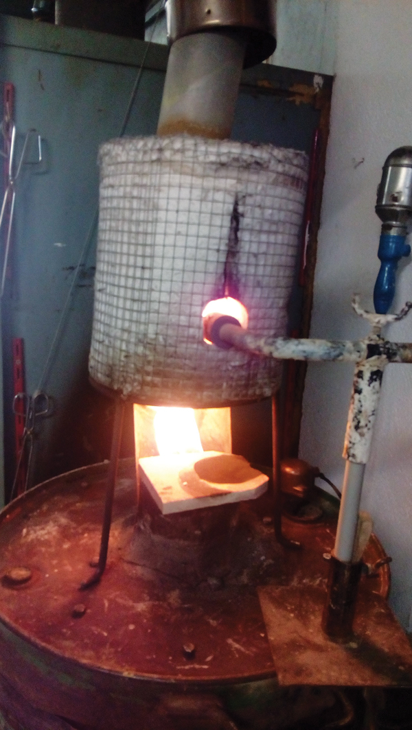 12 This secondary kiln was created to burn any remaining soot and ash from of the reduction atmosphere in the main kiln before it exhausts to the outside through the vent hood.
