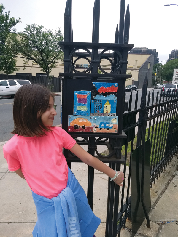 7 Dimitra Katsaras with her Queens’ inspired tile plaque for Neighborhood Stories.