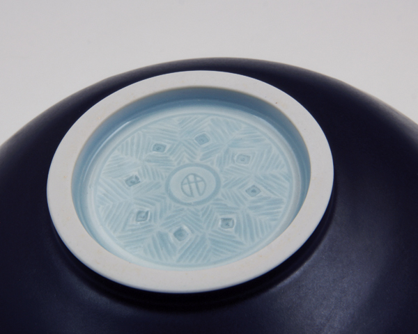 7 Small serving bowl with carved foot (alternate view), 7 in. (18 cm) in diameter, porcelain, blue celadon and satin black glazes, fired to cone 10 in reduction, 2017.