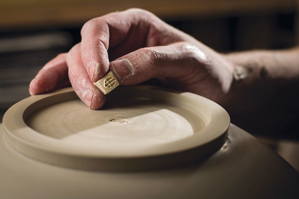 3 Thullen stamping a piece with his chop. Photo: Lex Dodson.