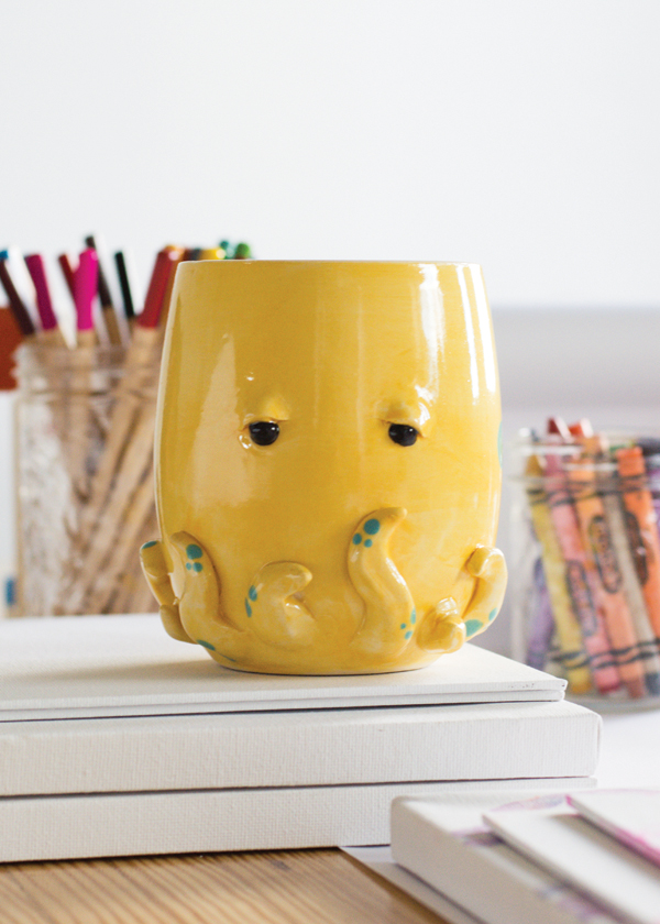 3 Blair and Sarah Dawes’ Octopus Mug, 5 in. (13 cm) in height, white stoneware, fired to cone 6. Photo: Brier Breton.