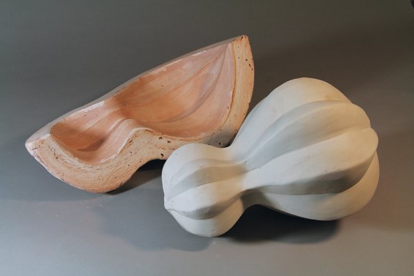 13 Four sections put together when leather hard to create the whole segmented form, then coated with white slip.