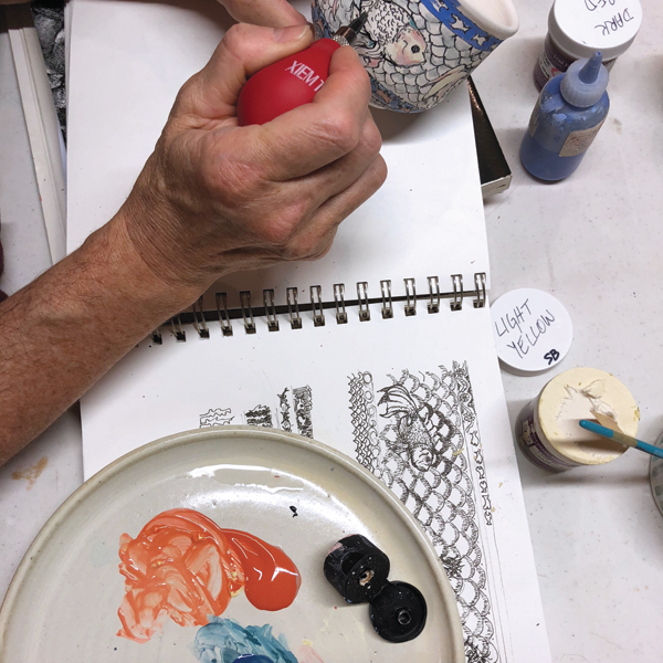 4 Painter Julia Morgan transcribes a sketch of her design to an Amrita Lash mug.