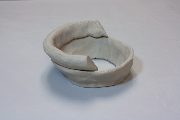 4 When building a form with a steep outward angle, attach triangular coils at the thinner ends. 