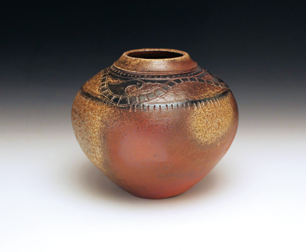 7 Wood-fired vase, 6 in. (15 cm) in diameter, stoneware, black slip.
