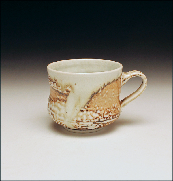 9 Flashed mug, 3½ in. (9 cm) in diameter, salt- and wood-fired porcelain, flashing slips. 7–9 Jared Zehmer’s personal designs.