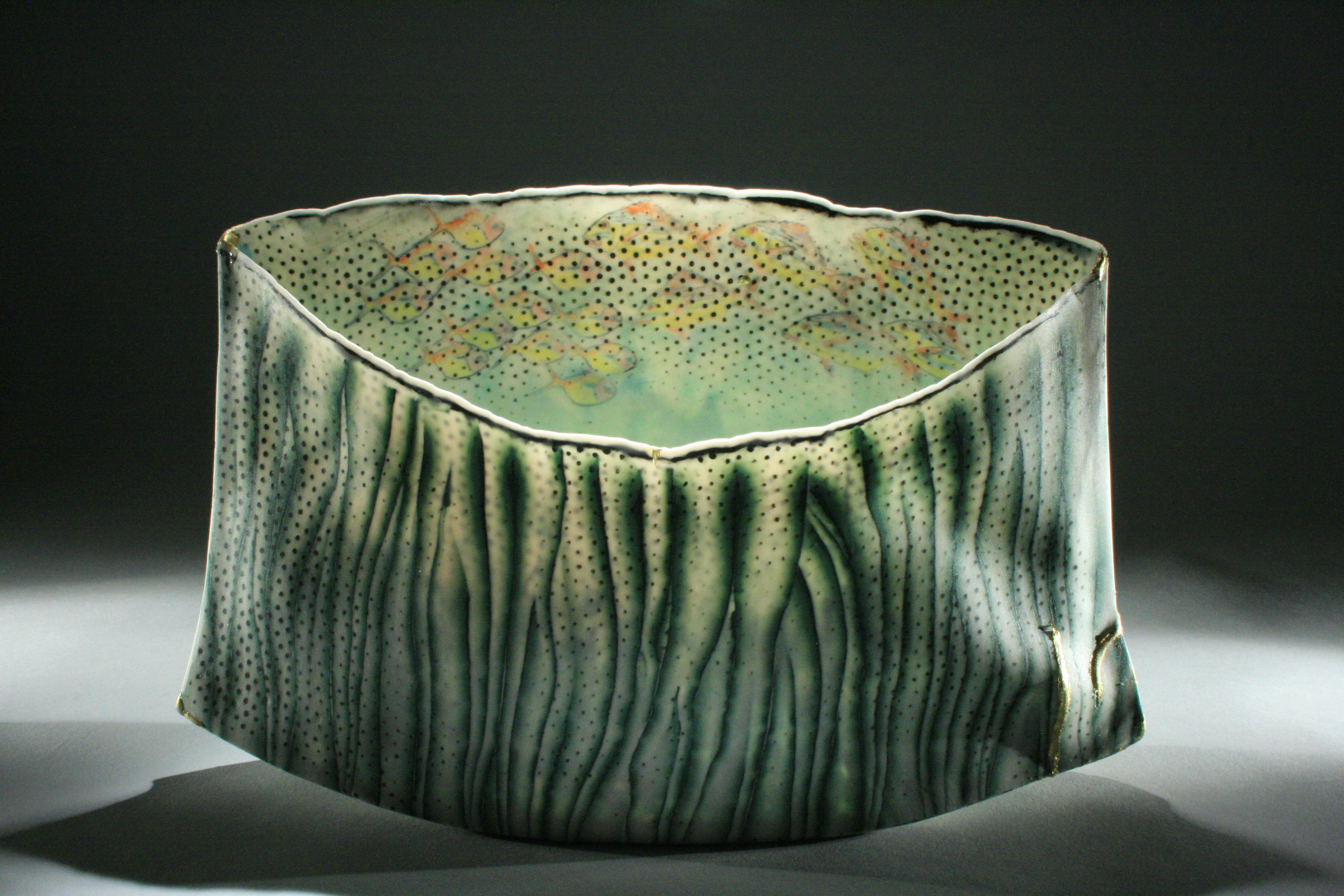3 Roil Below, 12 in. (30 cm) in width, colored porcelain, fired to cone 7, 2017.