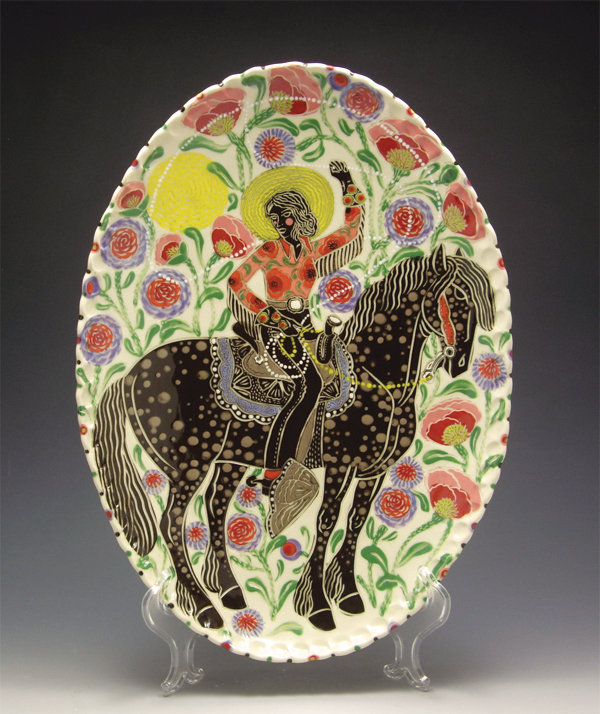 9 Trick-Roping Cowgirl, porcelain, drawn, carved, and underglazed surface decoration.