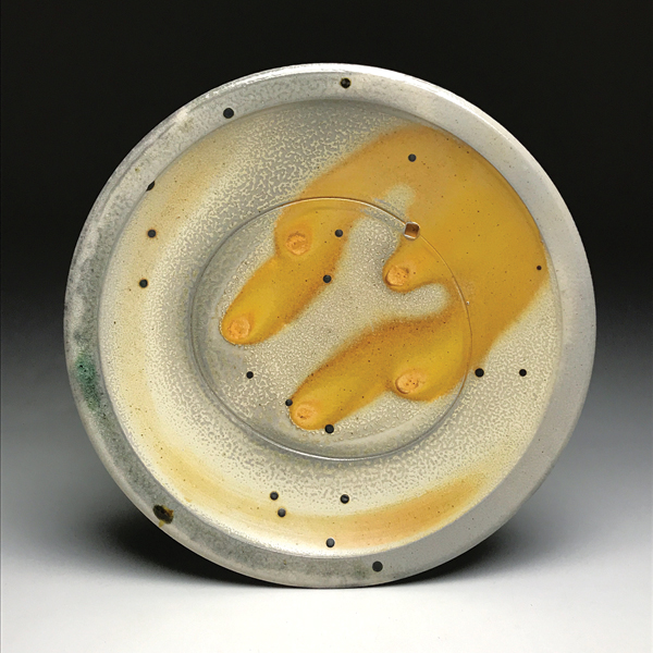2 Tim Sherman’s platter, 16 in. (41 cm) in diameter, wheel-thrown porcelain, buckshot, wood and soda fired.
